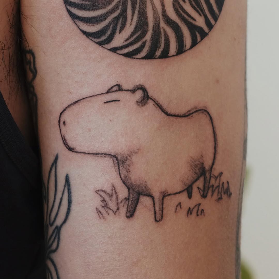 Adorable capybara tattoo with minimalist style