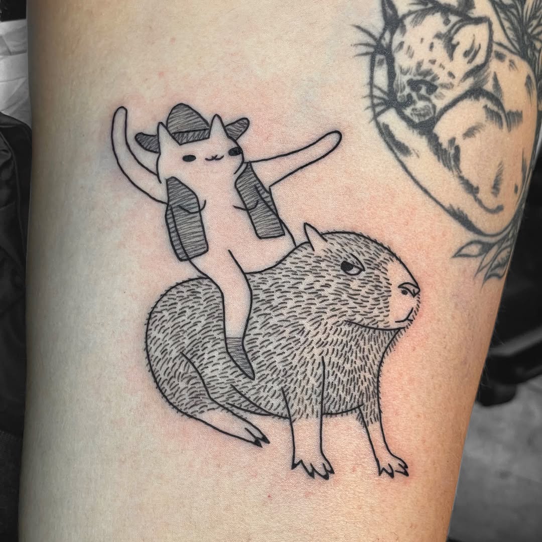Whimsical capybara tattoo with character twist