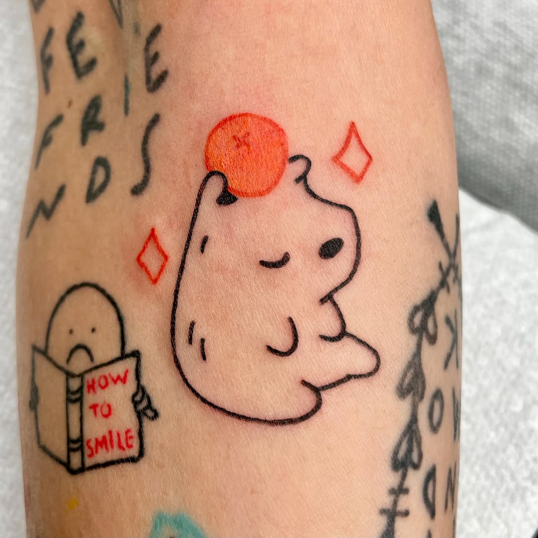 Cute capybara tattoo with a playful vibe