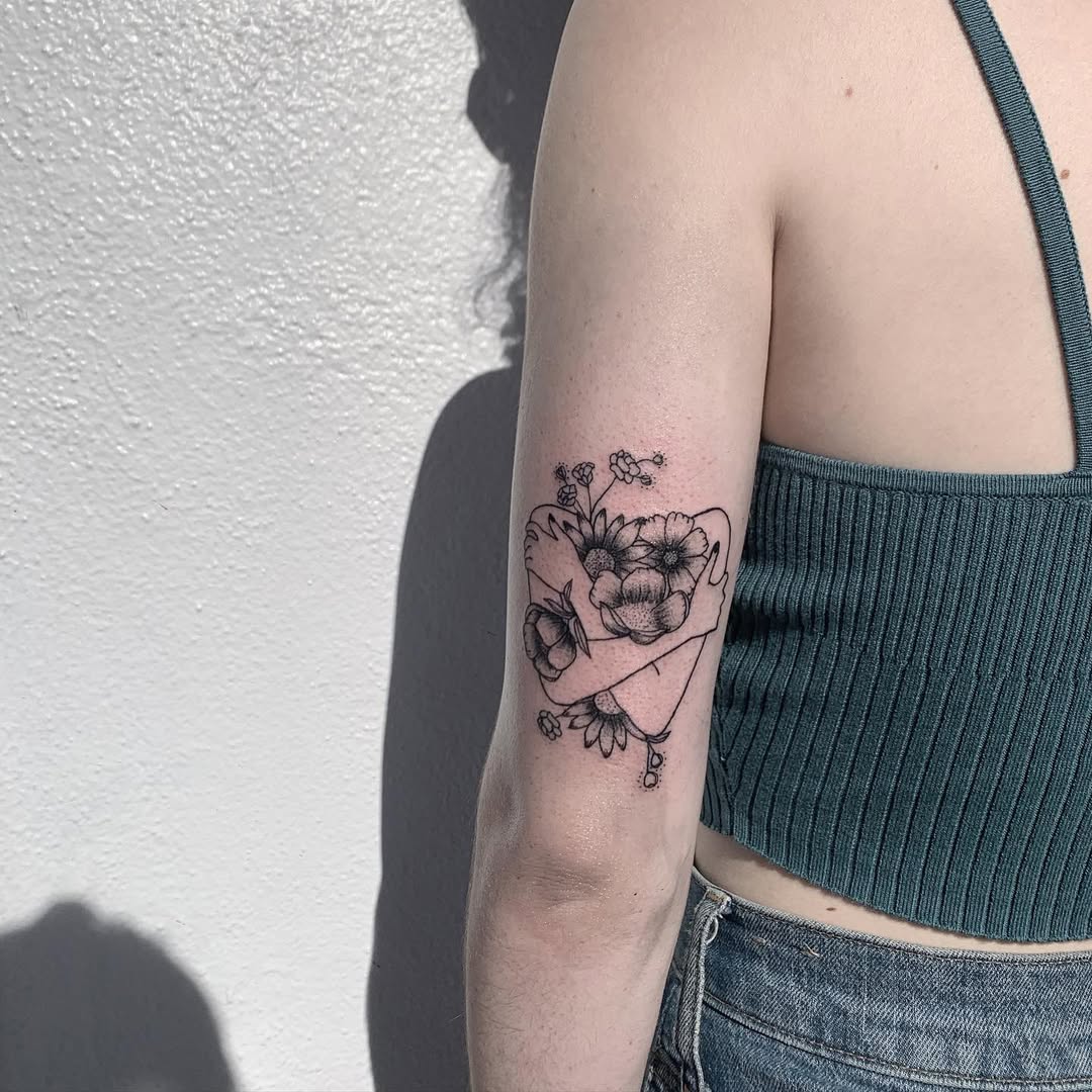 Elegant floral tattoo on a woman's arm
