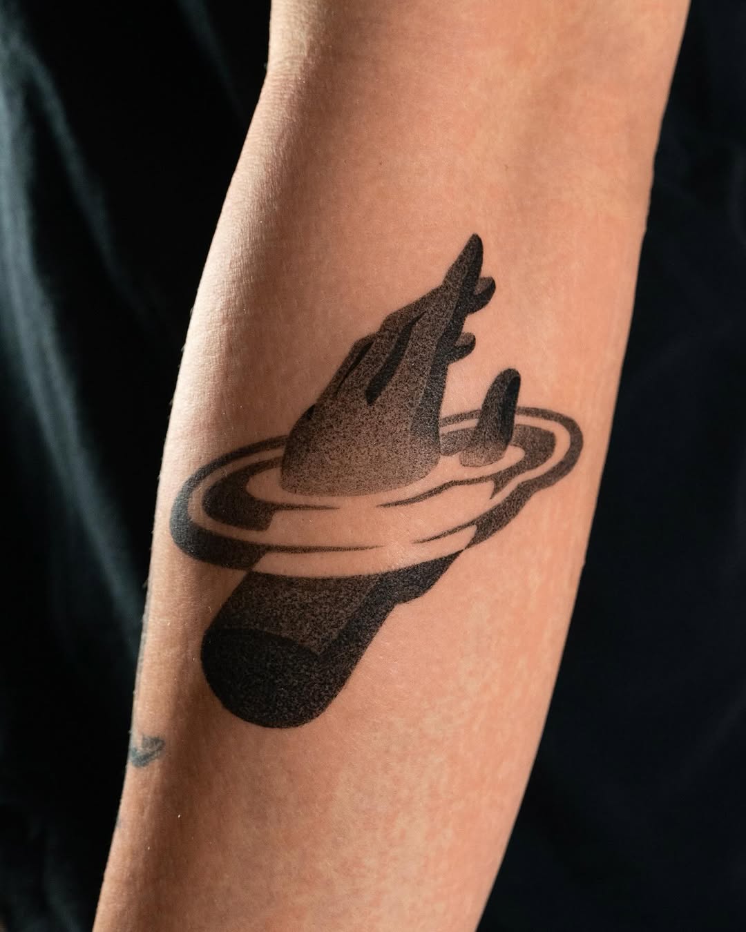 Symbolic hand tattoo inspired by growth imagery