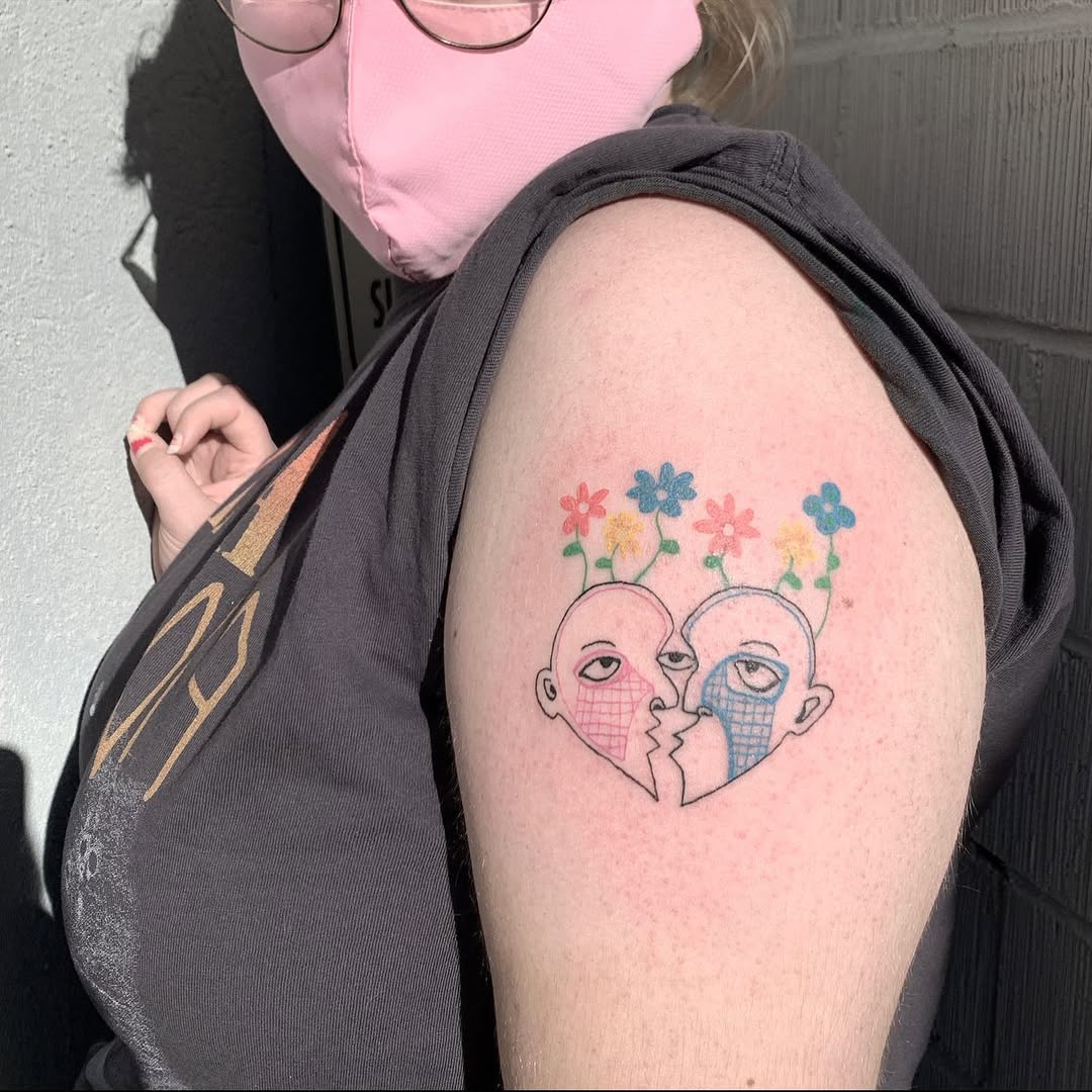 Unique Growth Tattoo of a Couple with Flowers