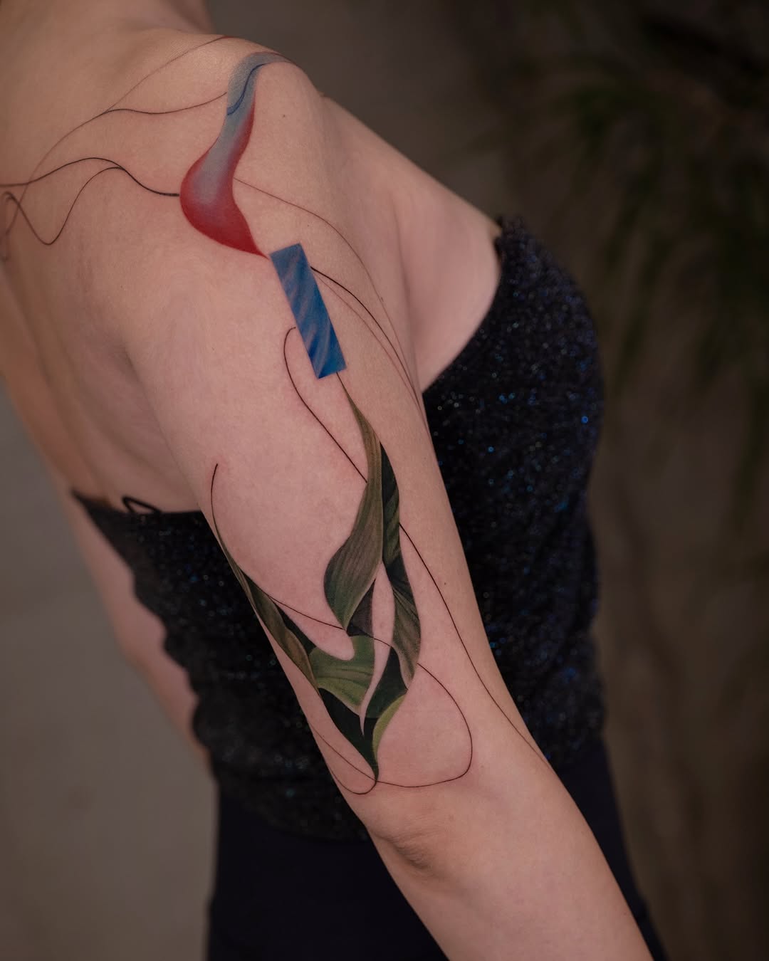 Colorful abstract floral growth tattoo design