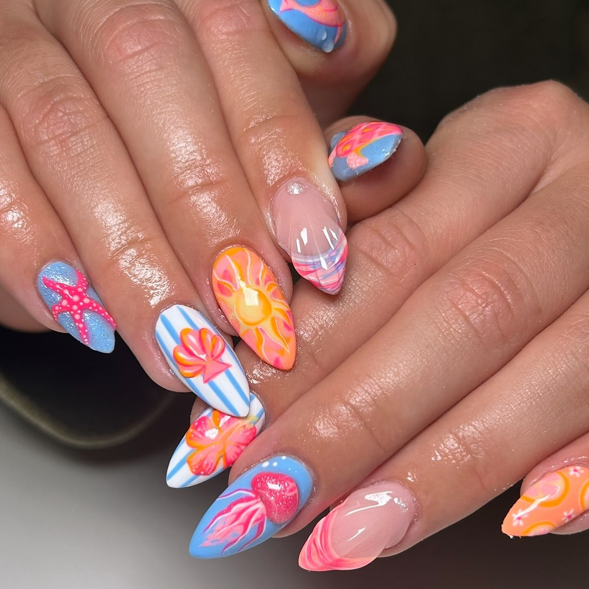 13. Striped Sunshine and Ocean Nail Art (Beach Nail Ideas)