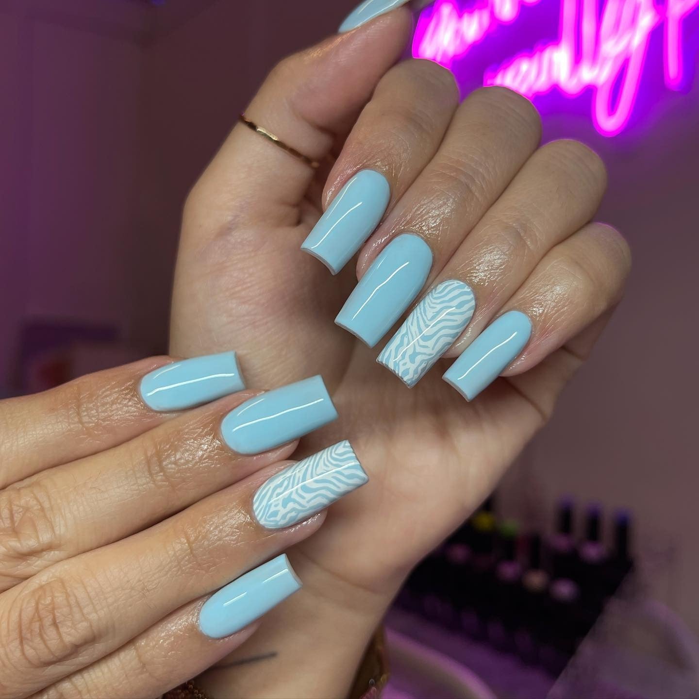 2. Sky Blue Coffin Nails with Minimal Line Art (Light Blue Nail Ideas)