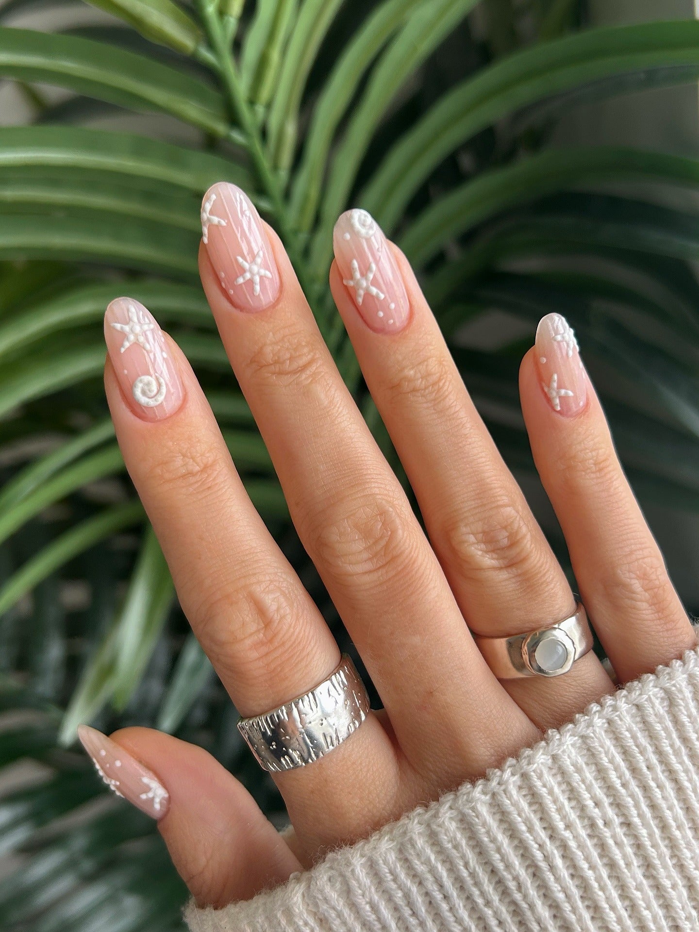 13. Frosted Snowflakes on Sheer Pink (Holiday Nail Ideas)