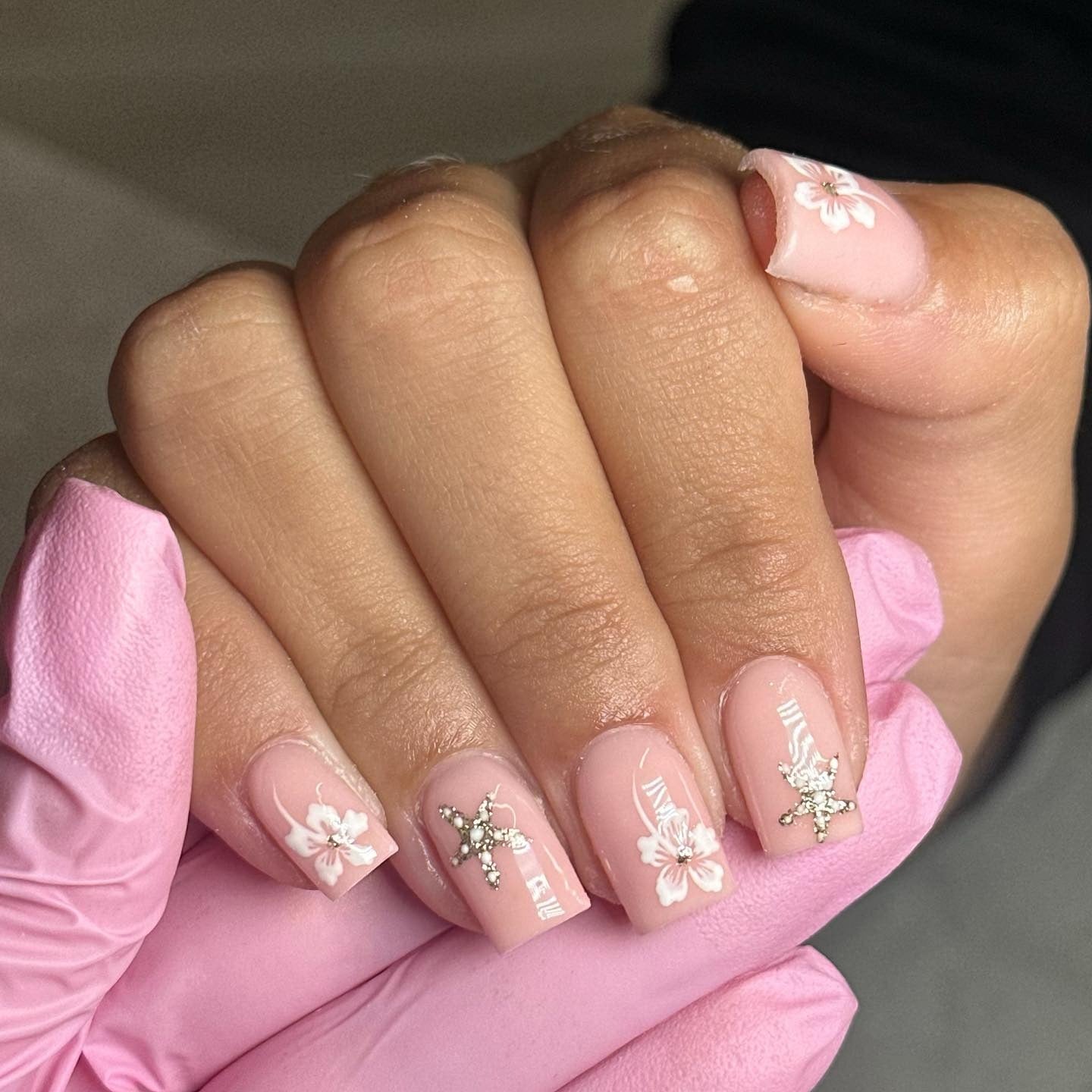 11. Delicate Blossoms with Crystal Accents (Holiday Nail Ideas)