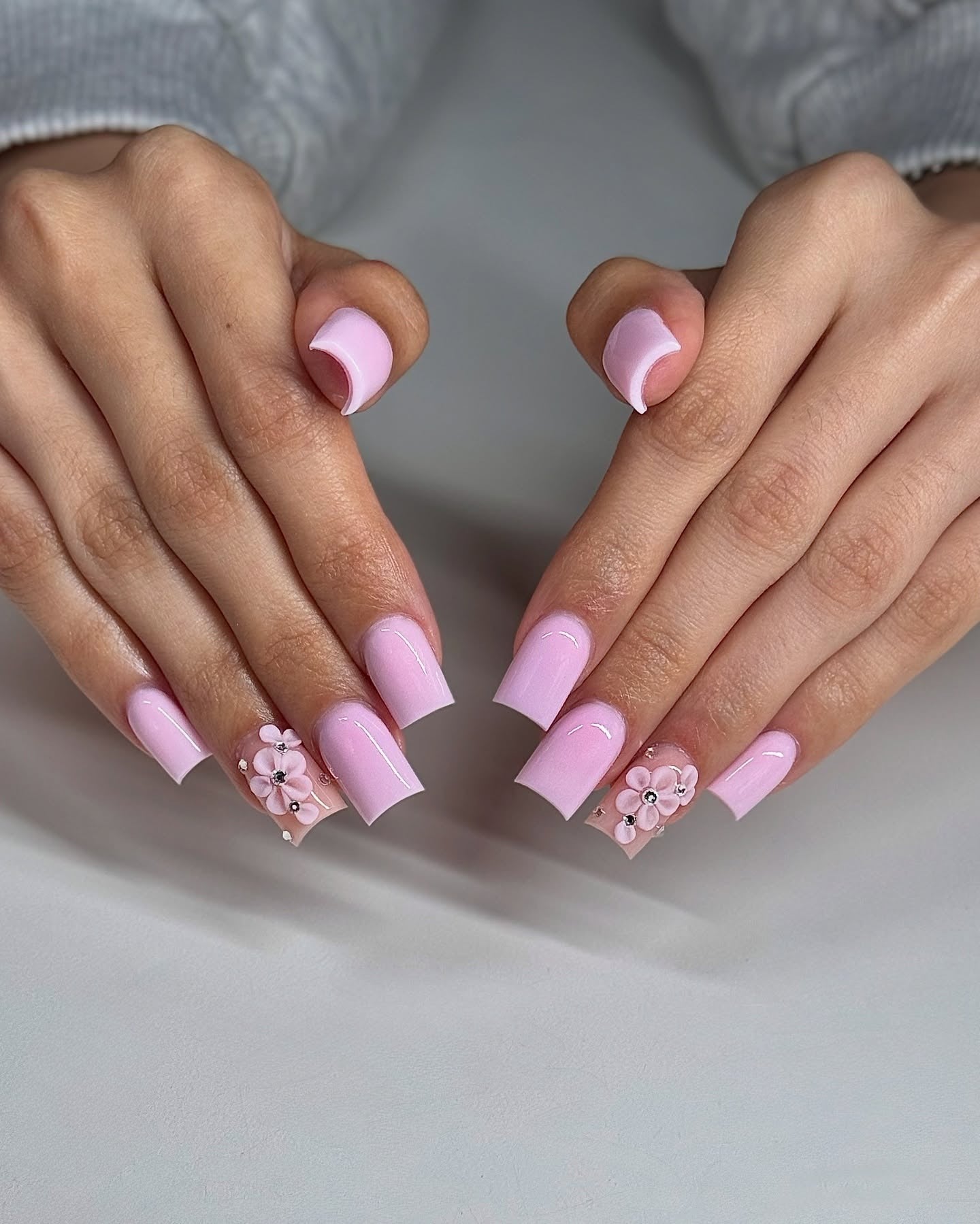 4. Glossy Light Pink Square Nails with Floral Gems (Light Pink Nail Ideas)